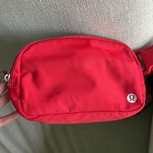 Red lululemon belt bag